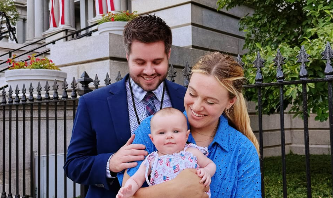 Isabel with her husband and daughter